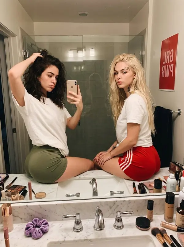 Bathroom mirror selfie, casual bestie energy — image 1