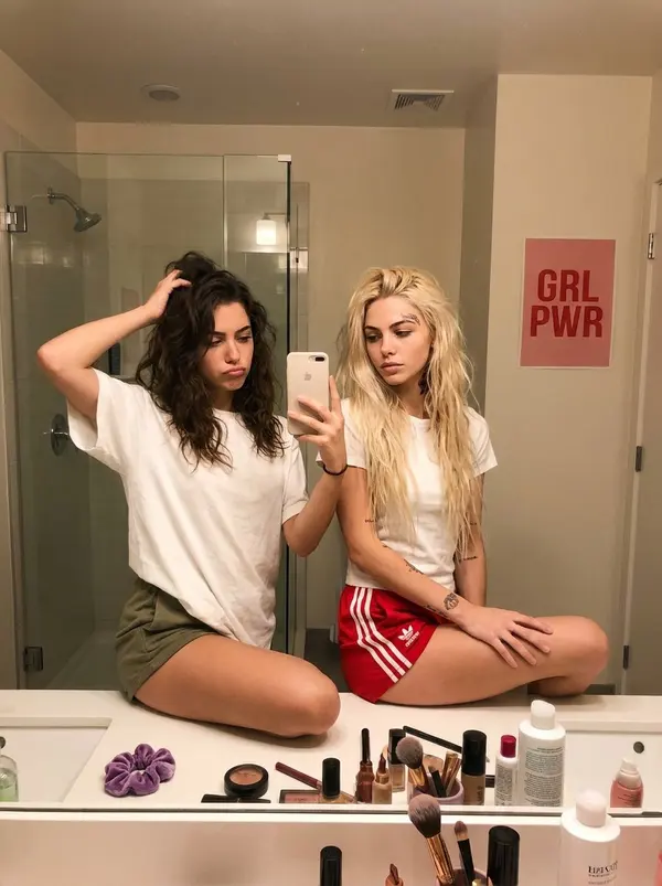 Bathroom mirror selfie, casual bestie energy — image 3