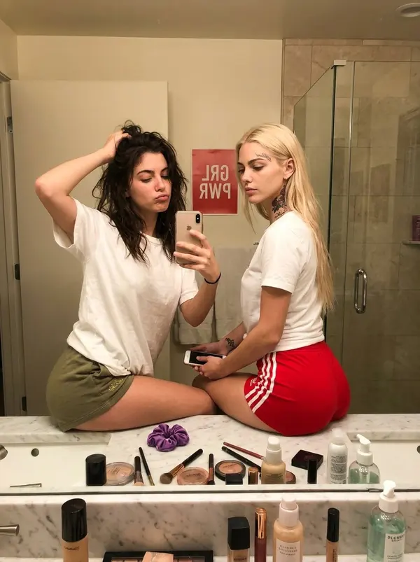 Bathroom mirror selfie, casual bestie energy — image 4