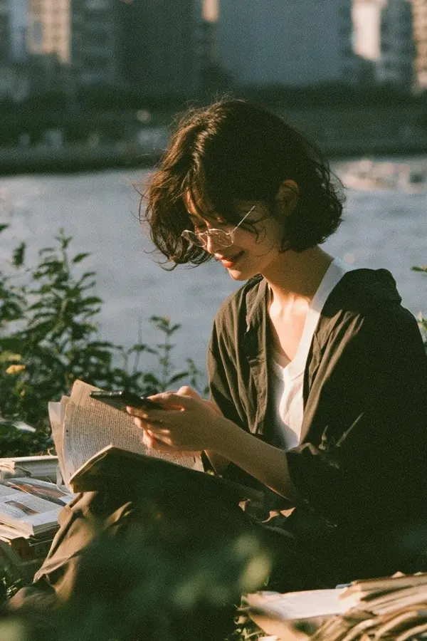 Woman Relaxing in Garden at Golden Hour — image 3