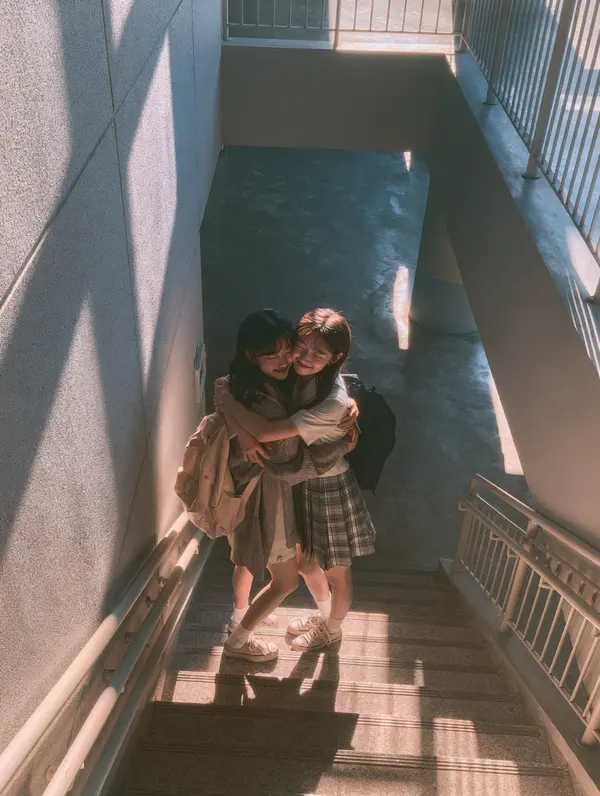 Candid School Stairwell Hug — image 2