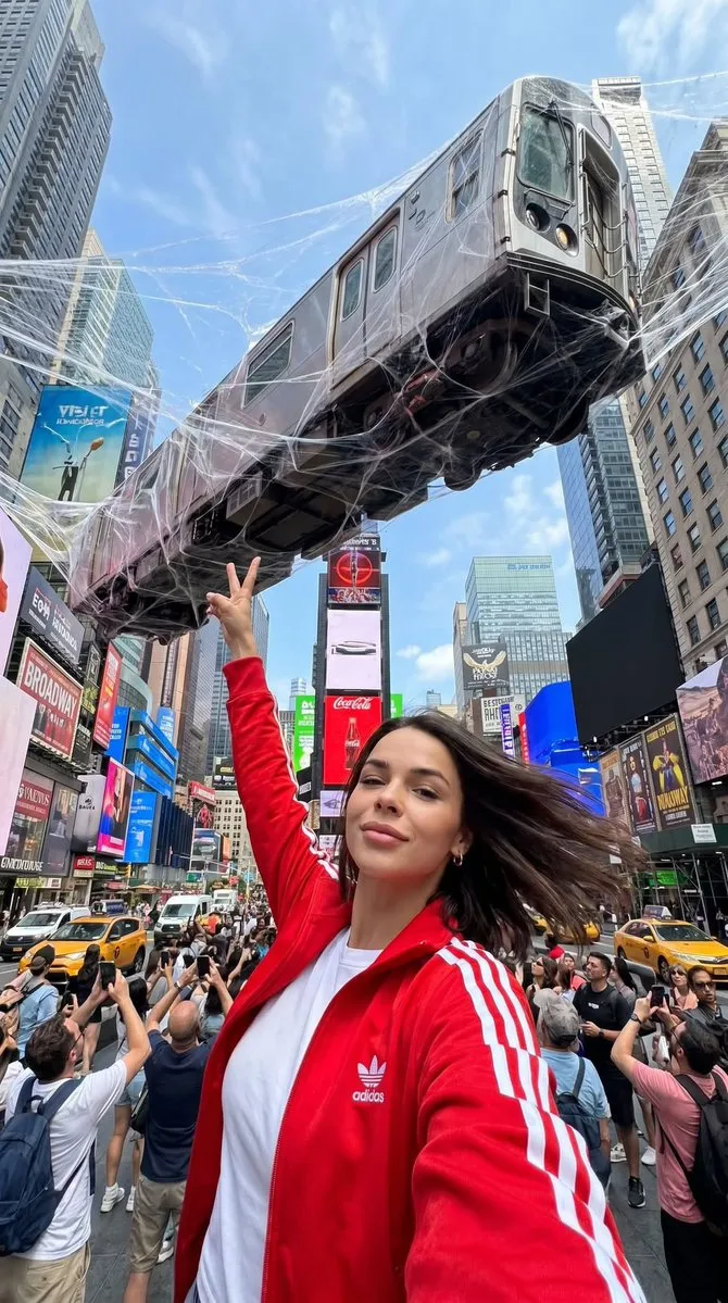 Times Square Selfie with Suspended Train